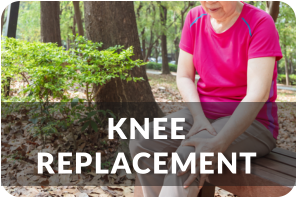 Senior woman sits on a bench in the park holding her knee in pain. Title reads: Knee Replacement